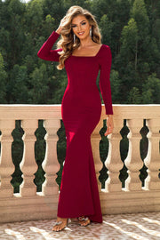 Red long sleeve maxi dress with square neckline and mermaid hem.