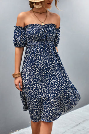 Dark blue floral midi dress with smocked bodice and bubble sleeves, off-the-shoulder neckline