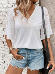 White v-neck tee with lace flared sleeves and a casual fit.