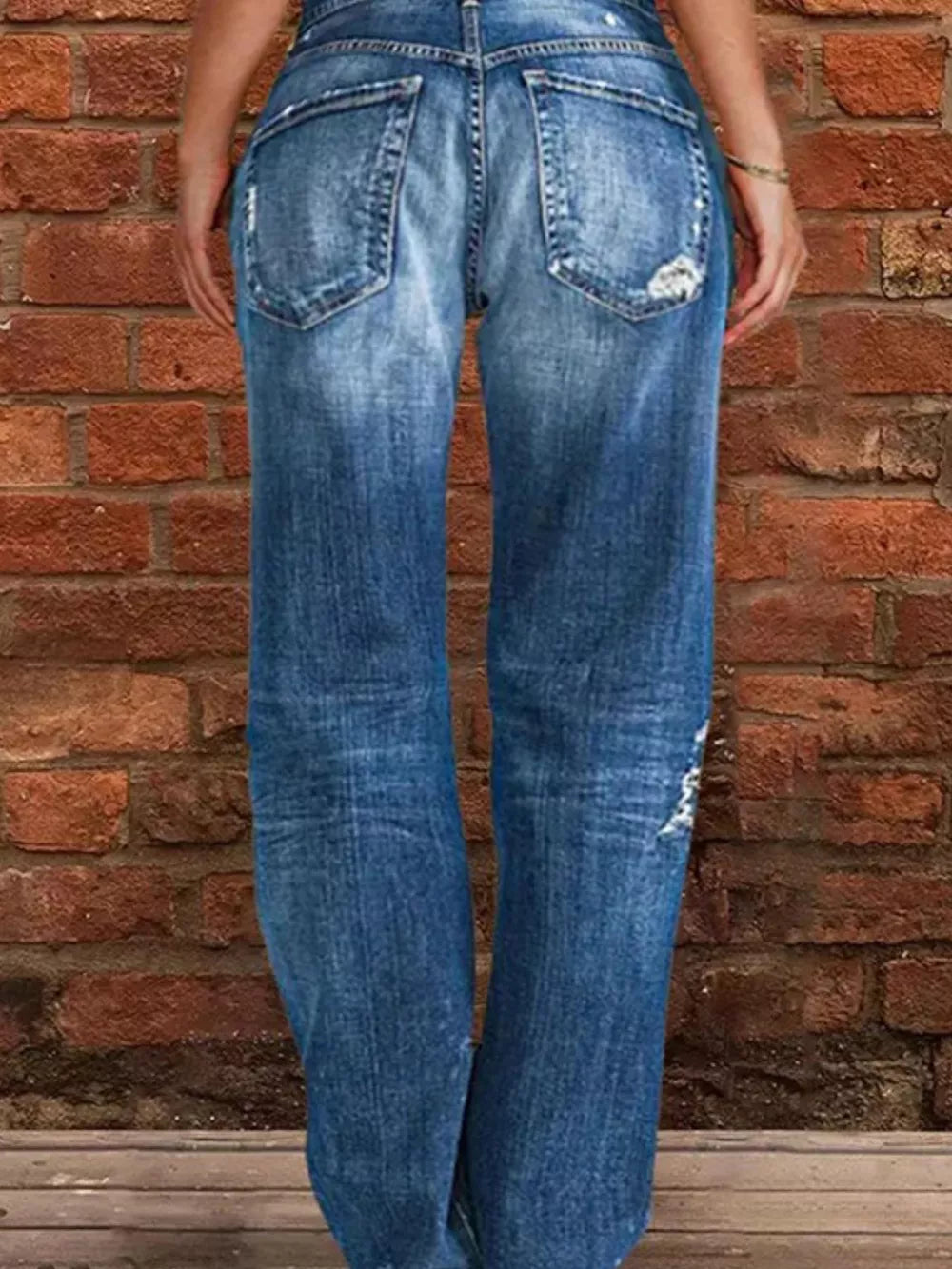 Relaxed fit distressed blue denim maternity jeans with raw hem detail