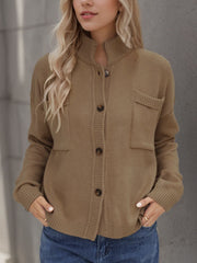 Camel stand collar knit cardigan with buttons and two chest pockets.