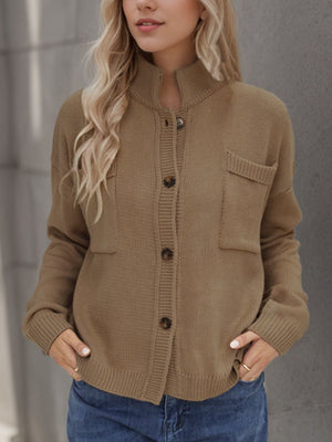 Camel stand collar knit cardigan with buttons and two chest pockets.