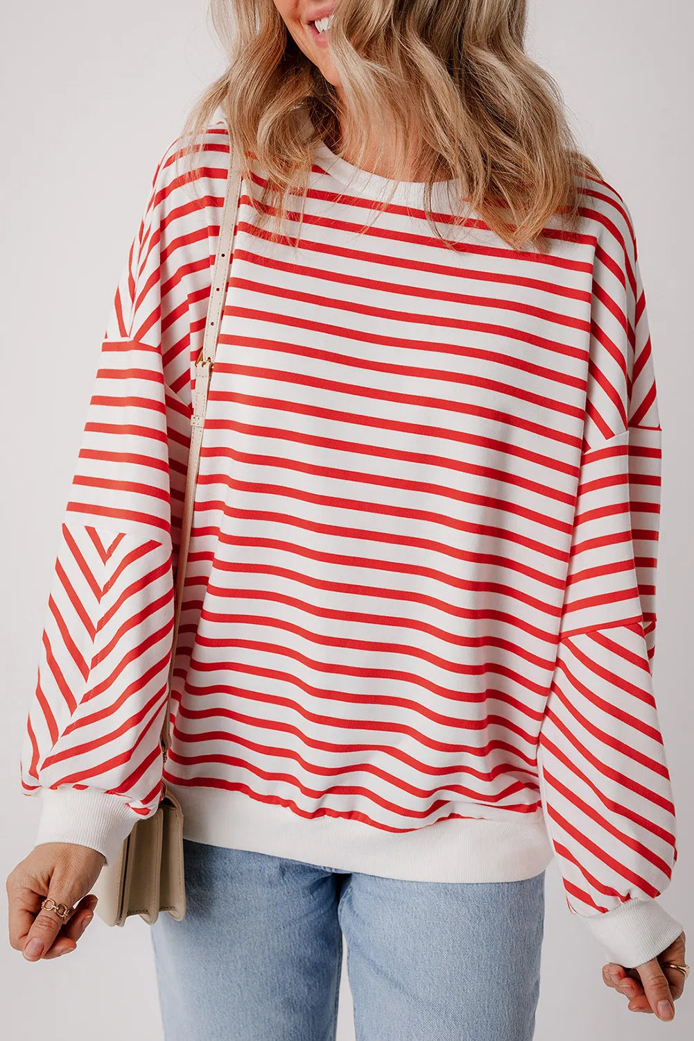 Chevron-Inset Stripe Sweatshirt in Strawberry red and white horizontal stripes with chevron detail on sleeves.