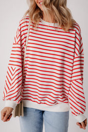 Chevron-Inset Stripe Sweatshirt in Strawberry red and white horizontal stripes with chevron detail on sleeves.