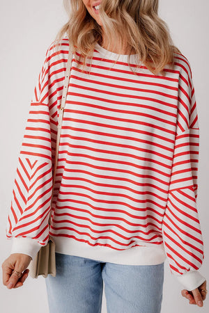 Chevron-Inset Stripe Sweatshirt in Strawberry red and white horizontal stripes with chevron detail on sleeves.