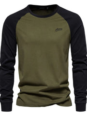 Army green and black colorblock raglan long sleeve tee with embroidered logo.
