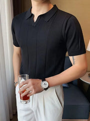 Black textured knit polo shirt with vertical ribbing and short sleeves.