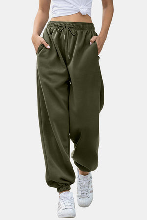 Army green sweatpants with gathered cuffs and drawstring waist.