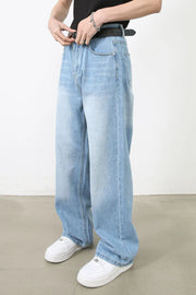 Light blue faded denim baggy jeans with a casual fit.