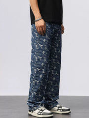 Relaxed fit blue cotton jeans with an abstract camouflage pattern