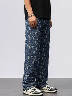 Relaxed fit blue cotton jeans with an abstract camouflage pattern