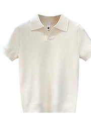 White textured knit polo shirt for men with short sleeves and a classic collar.