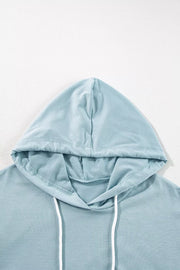 Solid Ruffled Hem Loose Fit Tunic Hoodie in Light Blue, fabric detail