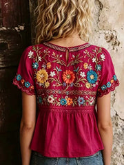 Plus Size Embroidered Floral Short Sleeve Top in Deep Rose, model styling view