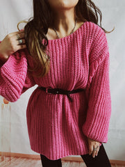 Hot pink oversized ribbed knit sweater with belted waist and crew neck.