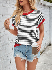 Textured stripe knit top with cap sleeves and red trim, styled with denim shorts.