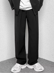 Black wide-leg casual pants with a relaxed fit, styled with a blazer and sneakers.