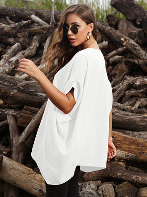 White draped asymmetrical sleeve blouse with a relaxed fit and casual styling.