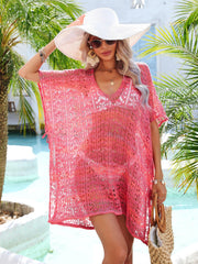 Hot pink lace-knit kaftan with V-neck and side tie detail, worn over a bikini.