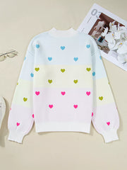 Women's crew neck knit sweater with colorful heart pattern and pastel stripes.