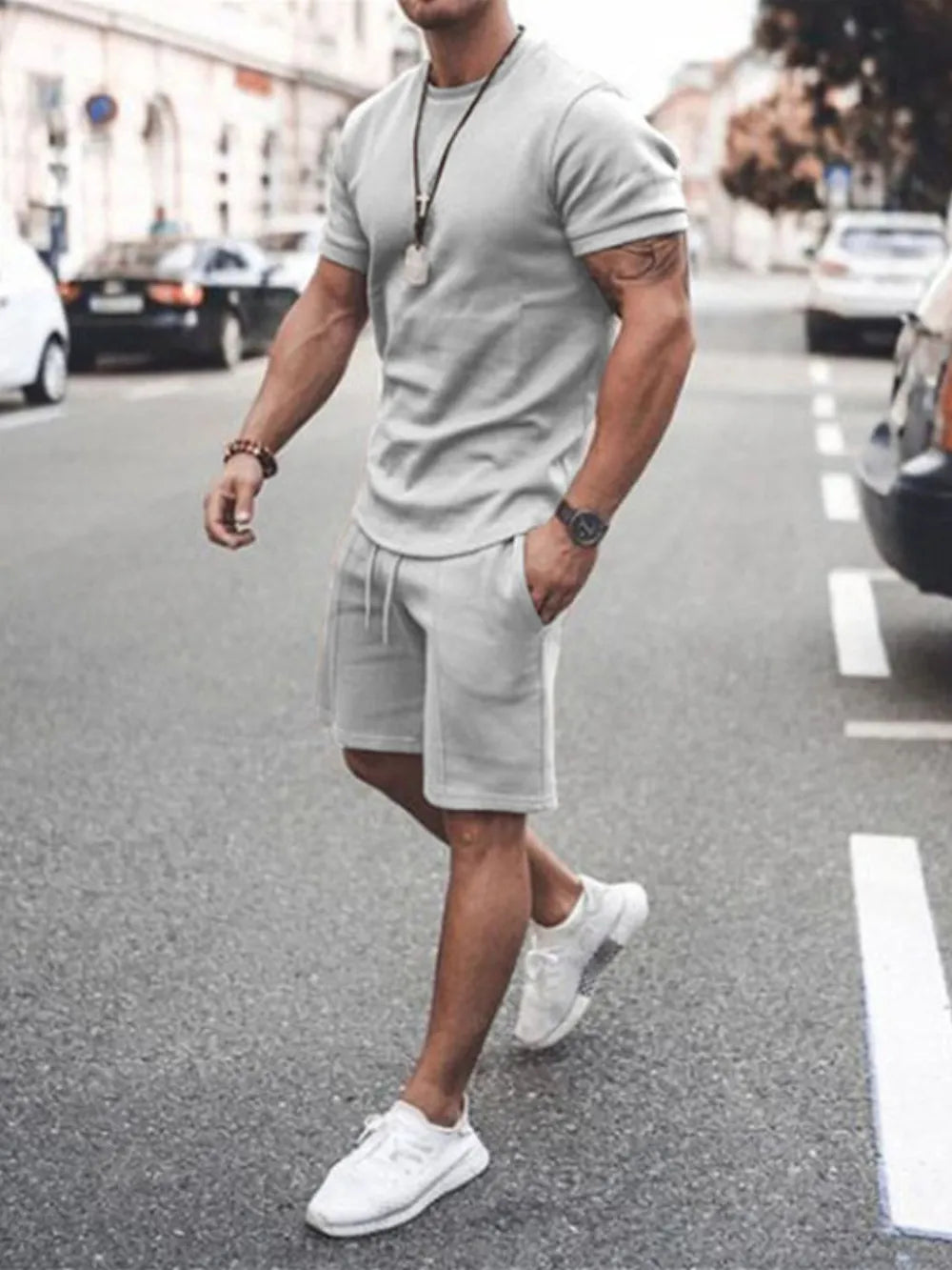 Men's grey short sleeve t-shirt and shorts co-ord set with drawstring waist.