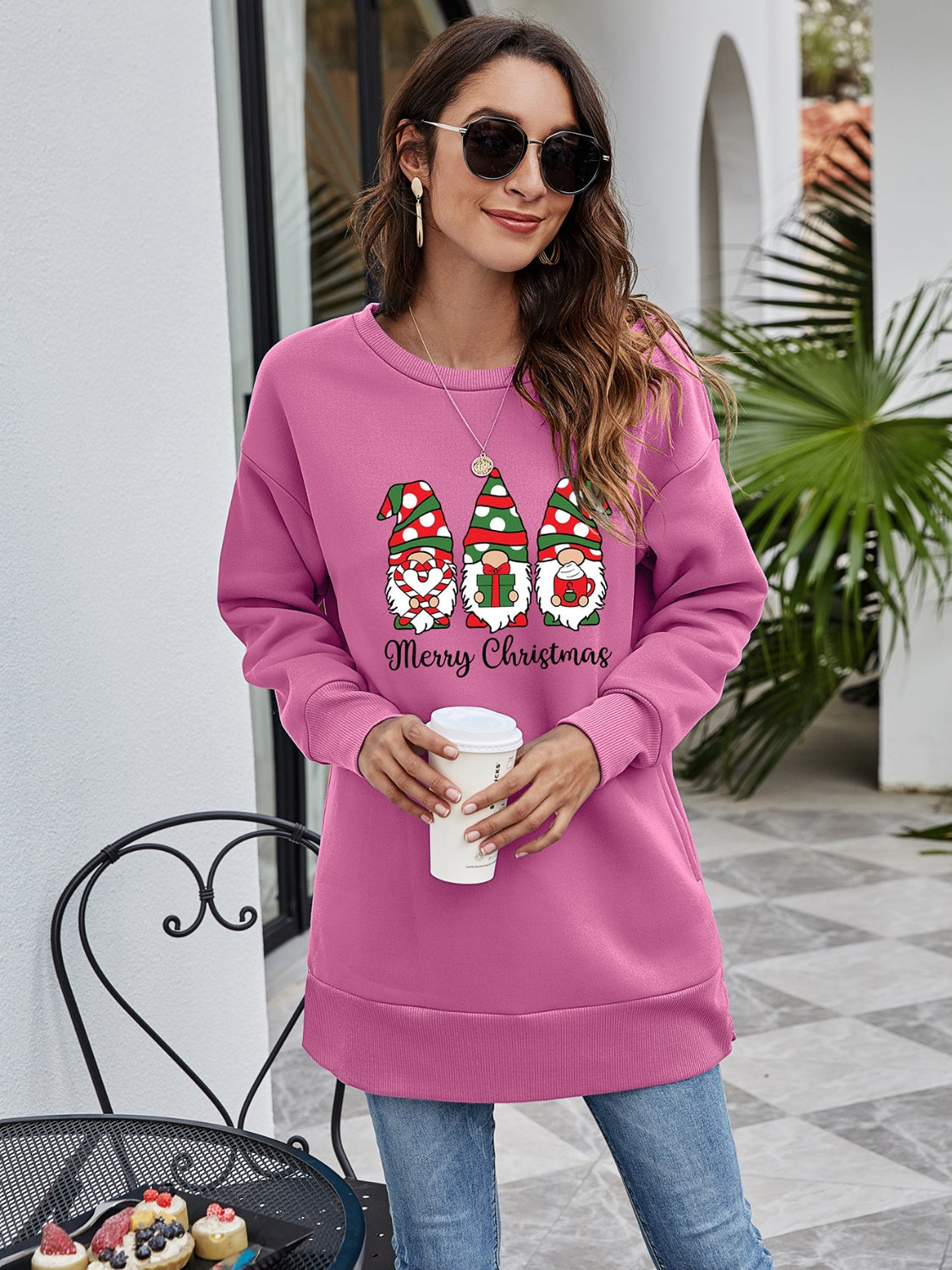 Pink Purple tunic sweatshirt with Christmas gnomes graphic and Merry Christmas text.