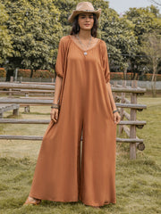 Caramel gathered sleeve wide-leg jumpsuit with a scoop neckline.