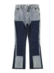 Split panel bootcut jeans in dark blue and light blue denim with paint splatter detail.