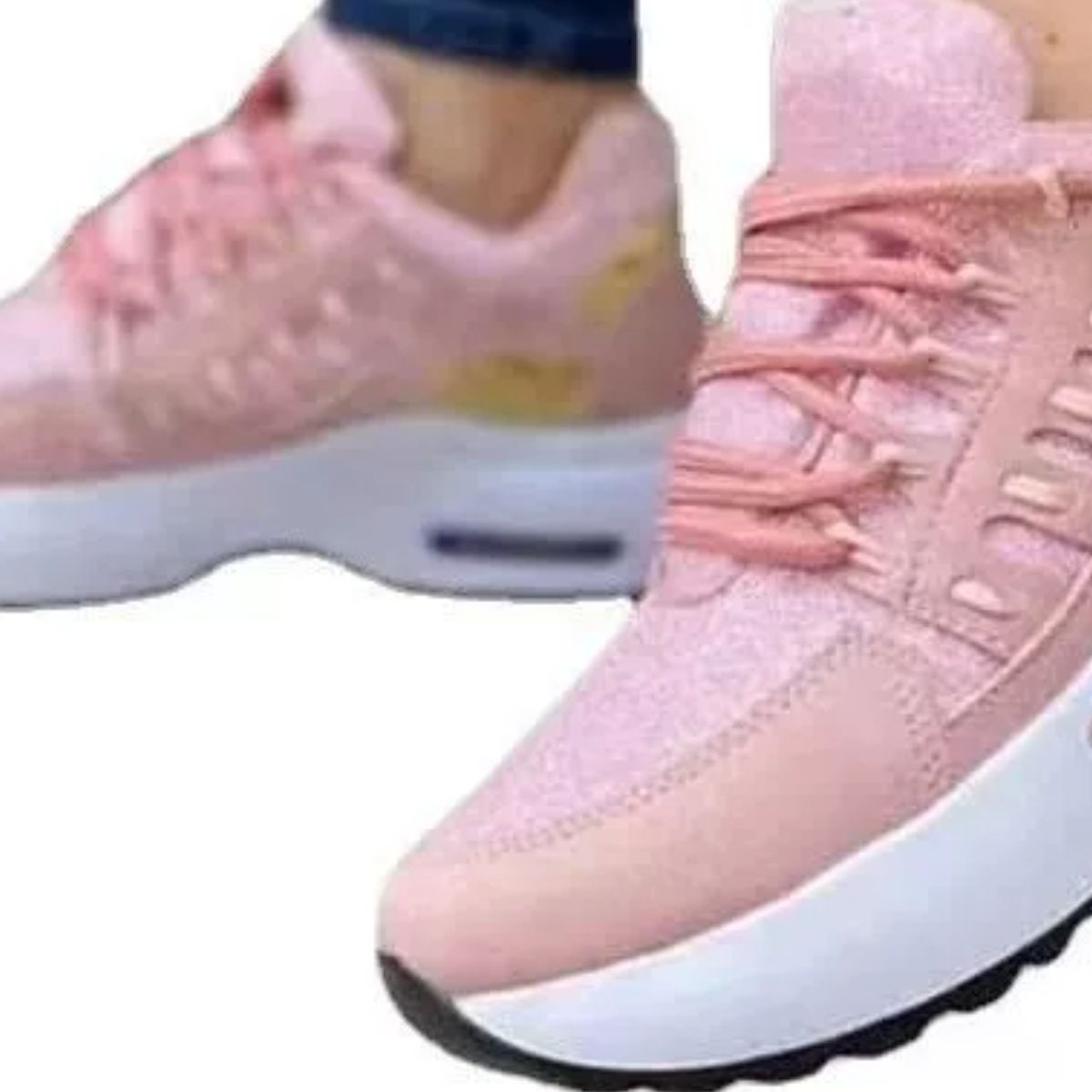 Pink lace-up chunky platform sneakers with white soles.