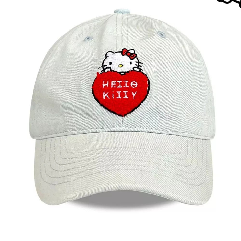 Light baseball cap with embroidered Hello Kitty on a red heart.