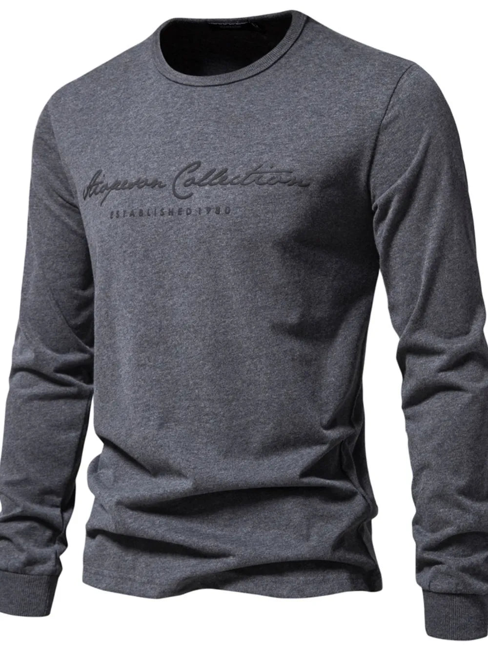 Dark gray crewneck long sleeve t-shirt with scripted "Aspen Collection Established 1980" graphic.