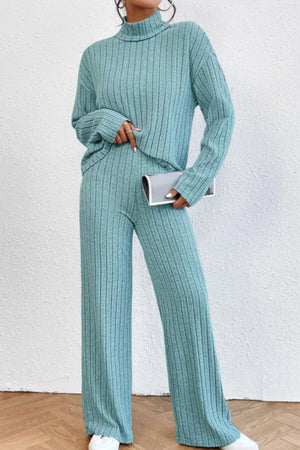 Aqua ribbed knit turtleneck lounge set with wide leg pants and long sleeves.