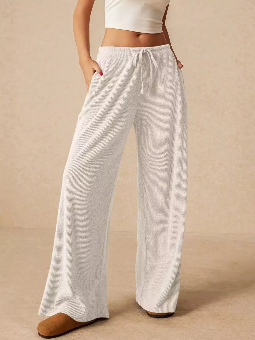 White ribbed wide-leg drawstring pants with pockets