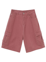 Magenta baggy cargo bermuda shorts with buttoned front and side pockets.