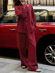Burgundy relaxed fit button-up shirt and wide-leg pants outfit set.