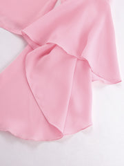 Pink ruffled flounce sleeve blouse with airy, casual style.