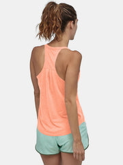 Coral racerback performance tank top with subtle pleating detail on back.