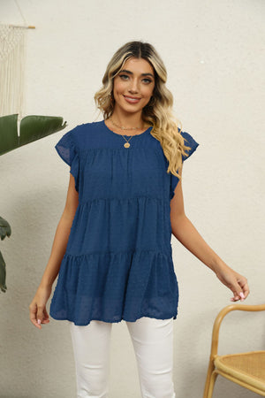 Peacock Blue Swiss dot tiered flutter sleeve blouse with round neckline