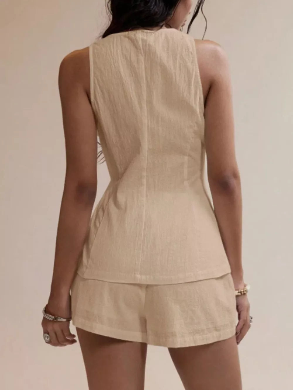 Apricot cotton two-piece summer set with sleeveless top and shorts.