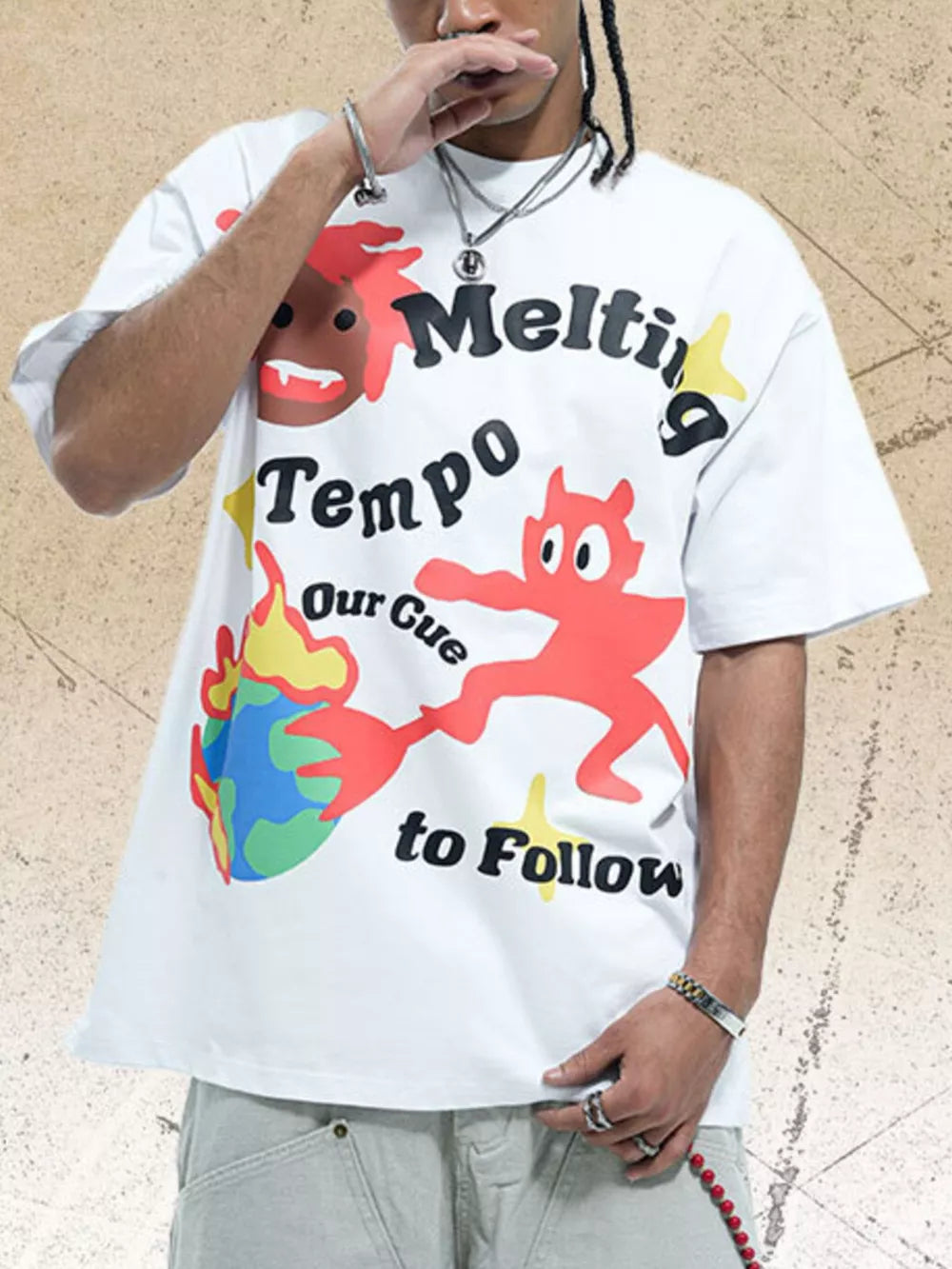 White cotton oversized t-shirt with bold graphic print and text.
