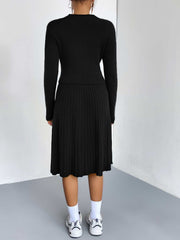 Black ribbed knit fit-and-flare co-ord with long sleeves and A-line skirt.