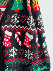 Black acrylic knit cardigan with festive Fair Isle pattern of Christmas trees, stockings, candy canes, and snowflakes.