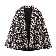 Leopard quilted kimono jacket with pockets and black trim.