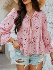 Dusty pink eyelet embroidered peplum blouse with tie neck and ruffled sleeves