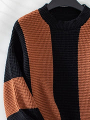 Colorblock stripe knit sweater in caramel and black, waffle knit texture, crew neck.