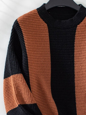 Colorblock stripe knit sweater in caramel and black, waffle knit texture, crew neck.