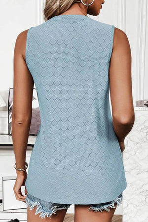 Textured sleeveless shell top in light blue with eyelet pattern