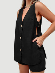 Black linen co-ord set with button front vest and cut-out sides.