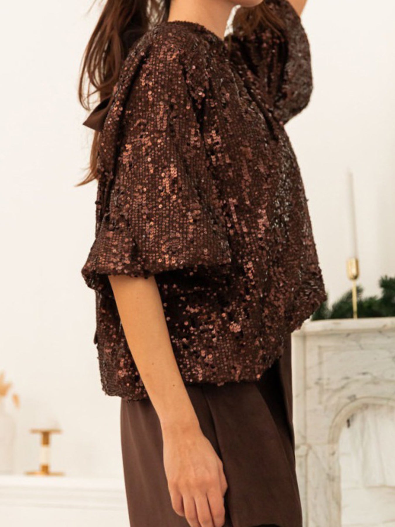 Dazzling sequin tie-back blouse in dark brown with short sleeves.