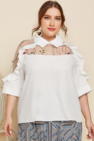 White ruffle sleeve blouse with sheer embroidered yoke and collar.